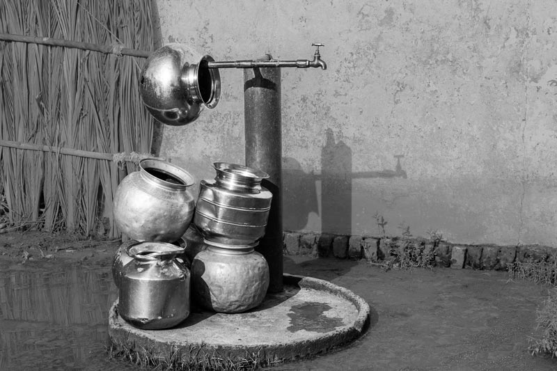 Impediments to enjoyment of Human Right to Water: 'Accessibility' Norm - Pots left behind in uncertainty after an uninformed long wait for water at a community standpoint near Kolleru Lake, Andhra Pradesh